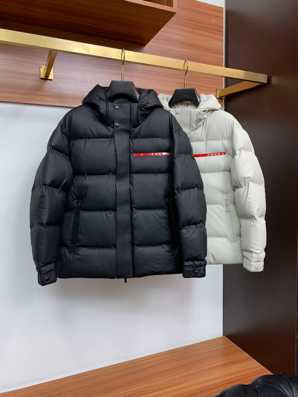 PRADA Black Hooded Down Jacket | Signature Red Accent & Modern Cold-Weather Style