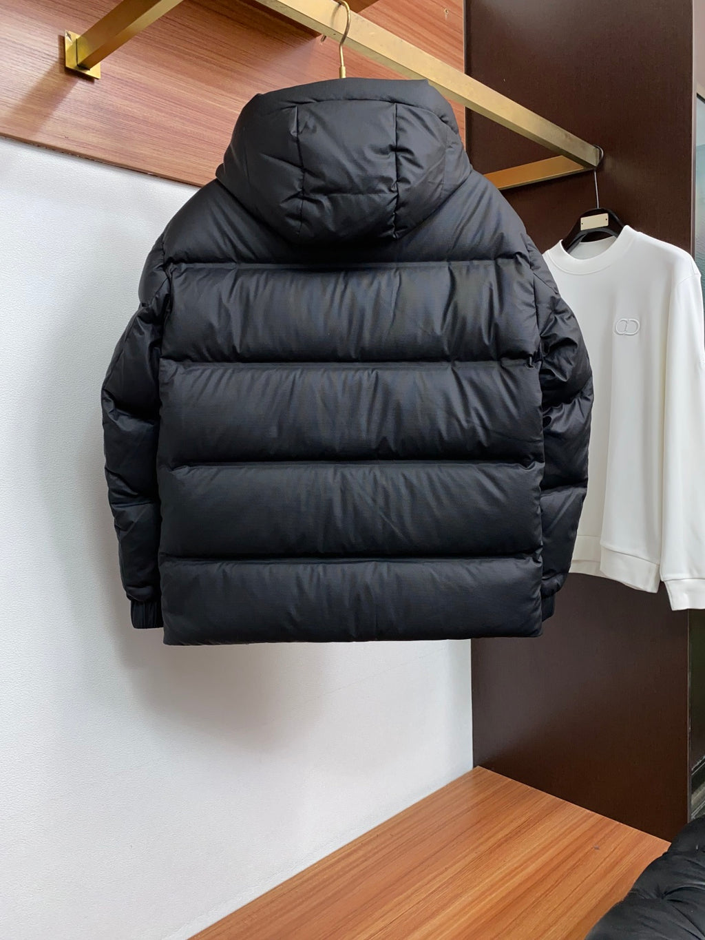 PRADA Black Hooded Down Jacket | Signature Red Accent & Modern Cold-Weather Style